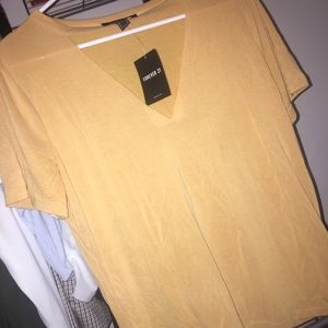 Yellow v neck shirt